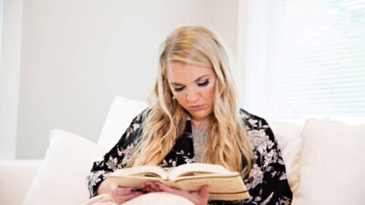 Katie reading a recommended book